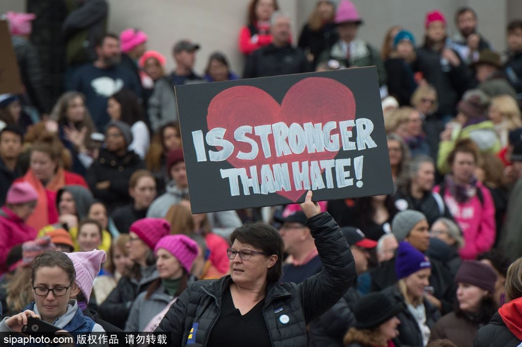 Mandatory Credit: Photo by John Middlebrook/CSM/REX/Shutterstock (7945857co) A marcher holds a sign during the Women's March on Washington the day after the inauguration of Donald Trump in Washington, DC NEWS Women's March on Washington, Washington Dc, USA - 21 Jan 2017